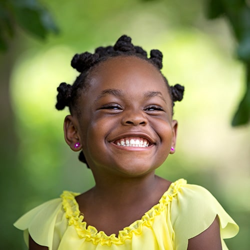 Kid smiling at Advanced Kids Dentistry in Burien, WA